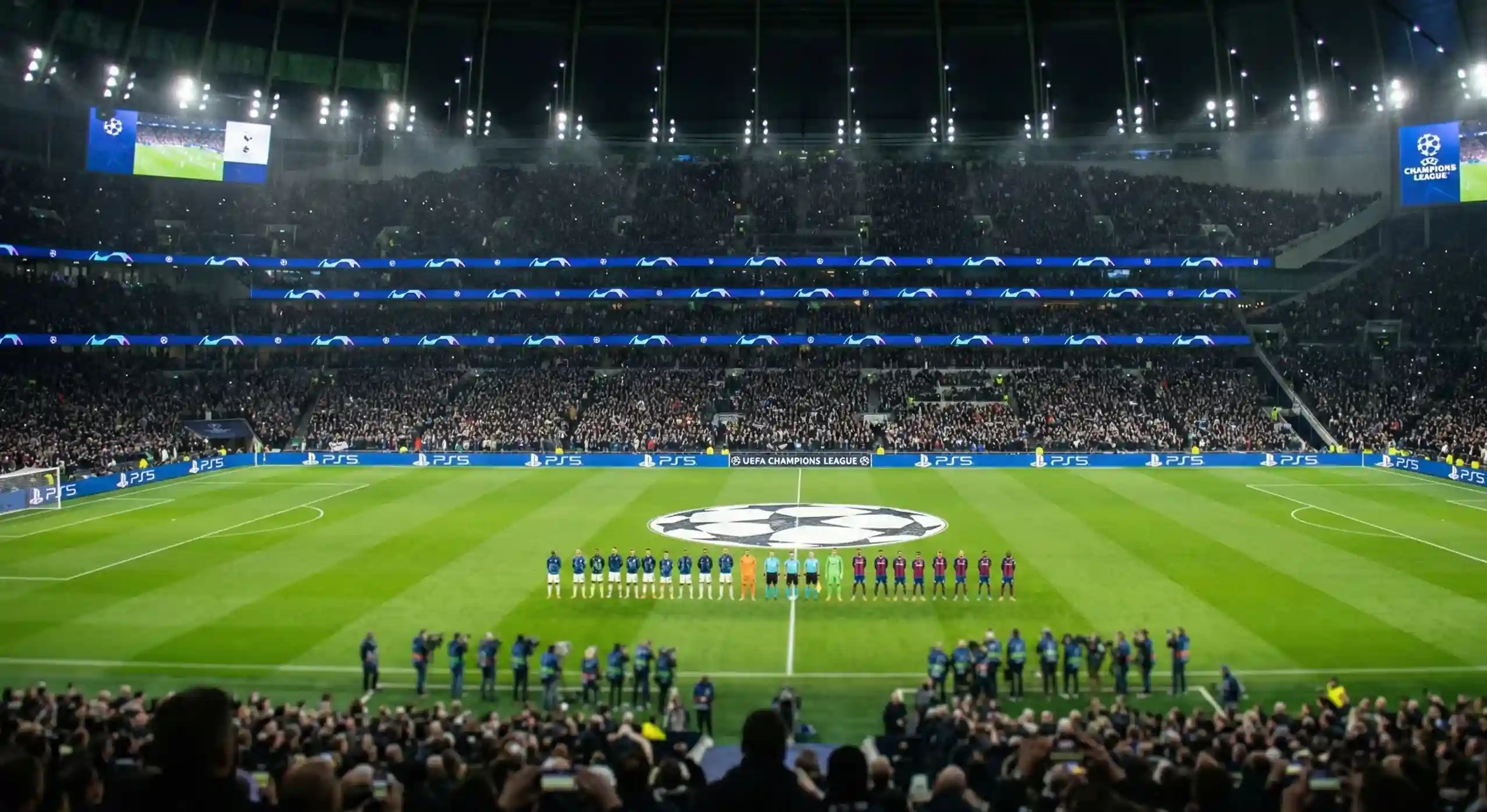 Champions League final match at a packed stadium under floodlights